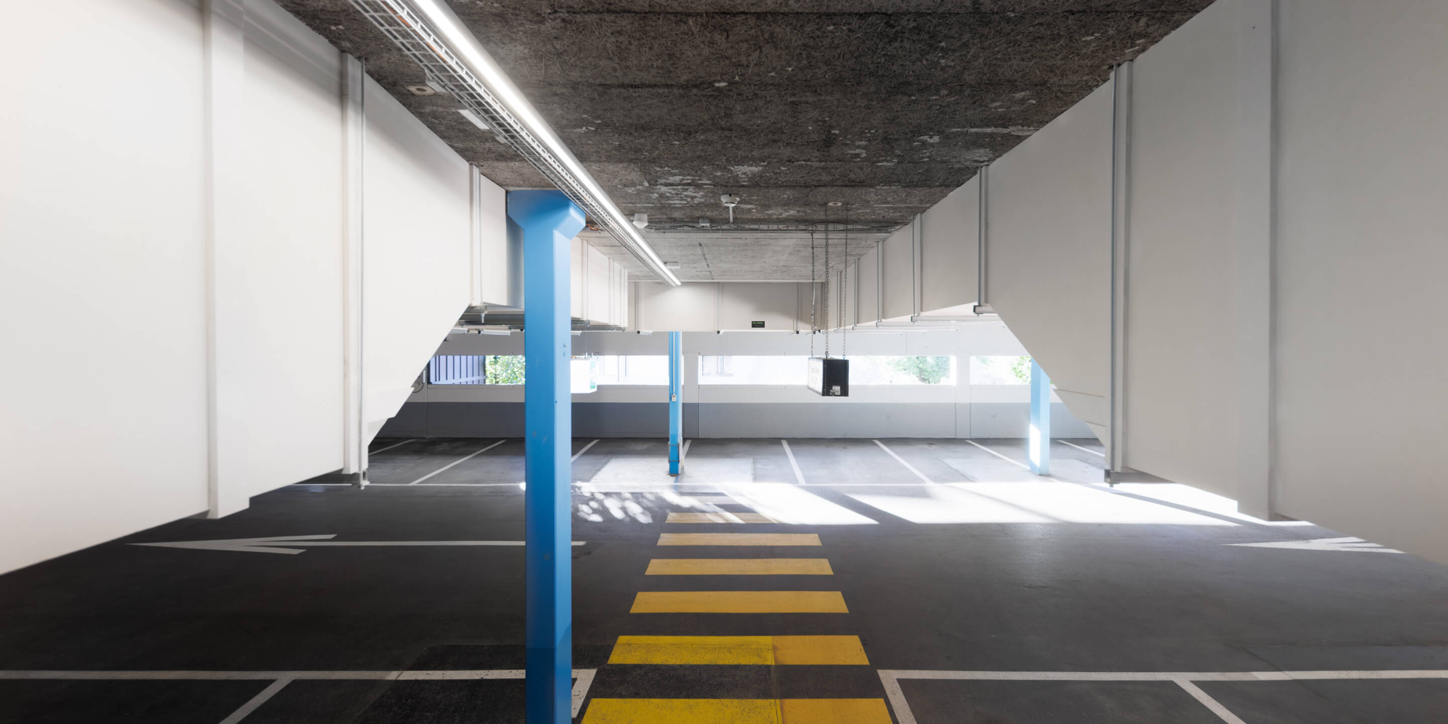 Entrauchungssystem im Parkhaus Adelboden mit selbständigem Entrauchungskanal, ausgeführt von Olisol AG.